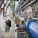 LHC acceleratoren på CERN og arbejdere som laver arbejde på den
